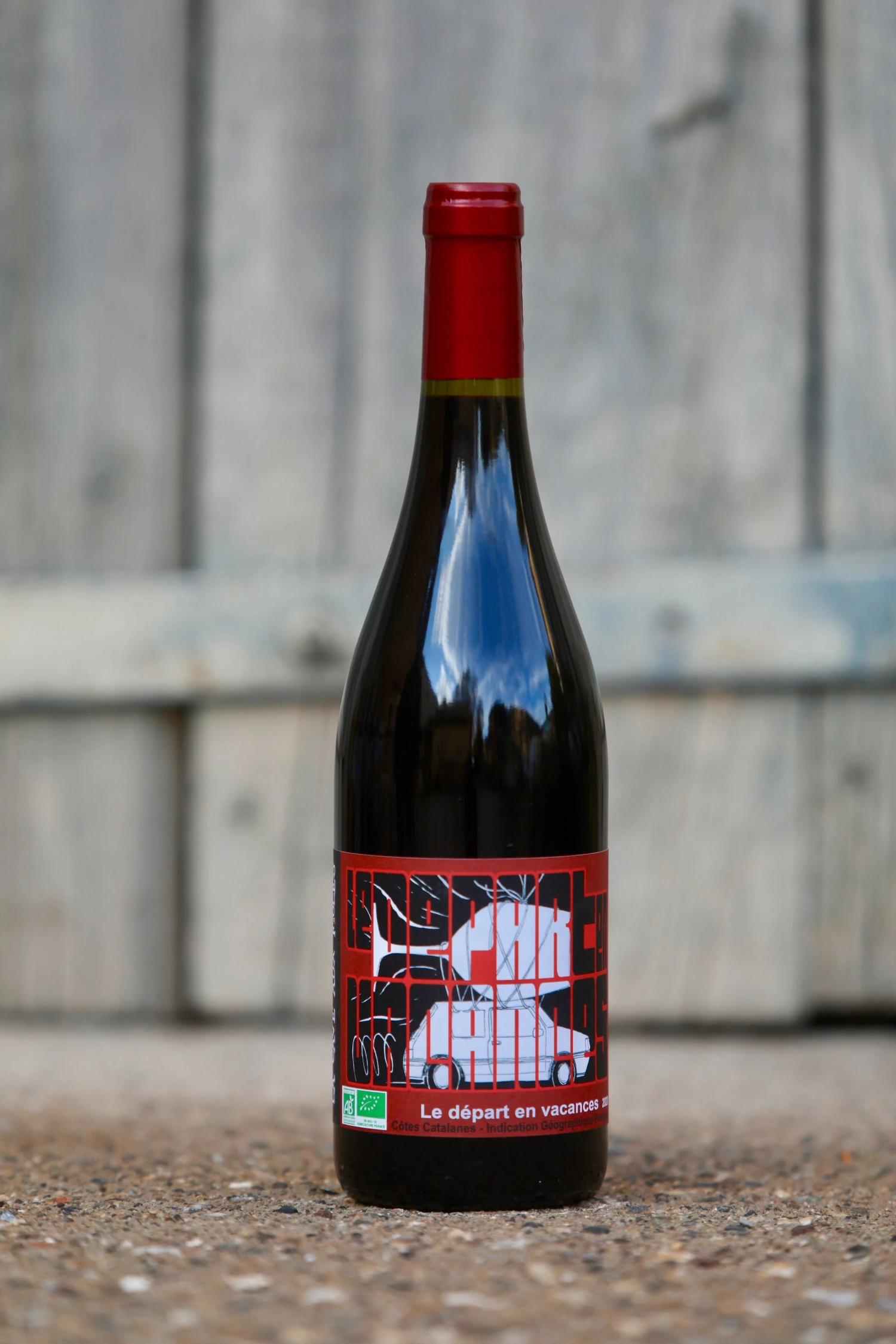 Bouteille de départ en vacances rouges